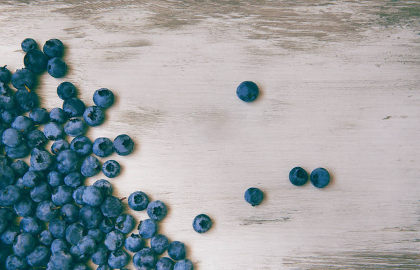 Blueberries on vintage style background. Image is with selective - Photo, Image