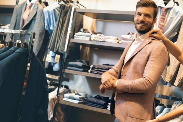 Customer man in man’s cloths store having help  - Fotoğraf, Görsel