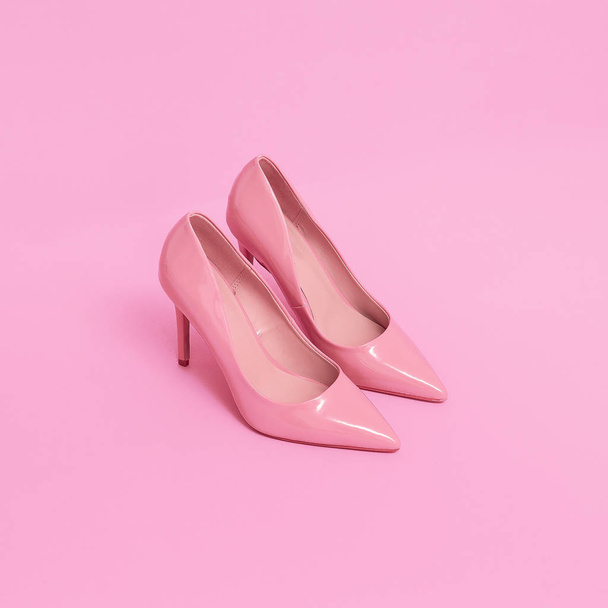 Pink patent leather shoes on a pink background. Pastel colours t - Φωτογραφία, εικόνα