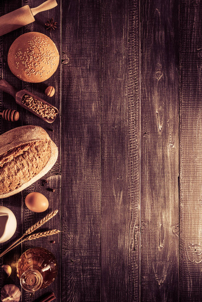 bread and bakery products on wood  - Zdjęcie, obraz