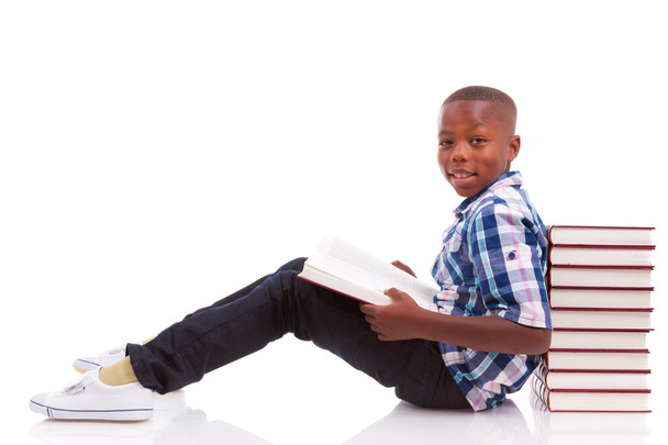 African American school boy reading a book - Black people - Photo, image