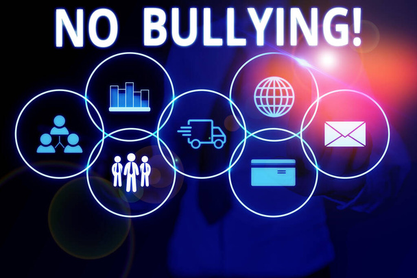 Text sign showing No Bullying. Conceptual photo stop aggressive behavior among children power imbalance Woman wear formal work suit presenting presentation using smart device. - Photo, Image