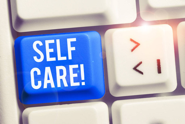 Text sign showing Self Care. Conceptual photo practice of taking action preserve or improve ones own health White pc keyboard with empty note paper above white background key copy space. - Photo, Image