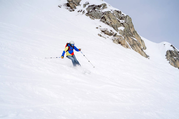 Sports woman skiing on snowy slope. - Foto, immagini