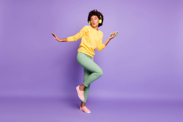 Full length body size view of nice attractive charming dreamy funky funny cheerful wavy-haired girl listening soul dancing having fun isolated over violet purple lilac pastel color background - Zdjęcie, obraz