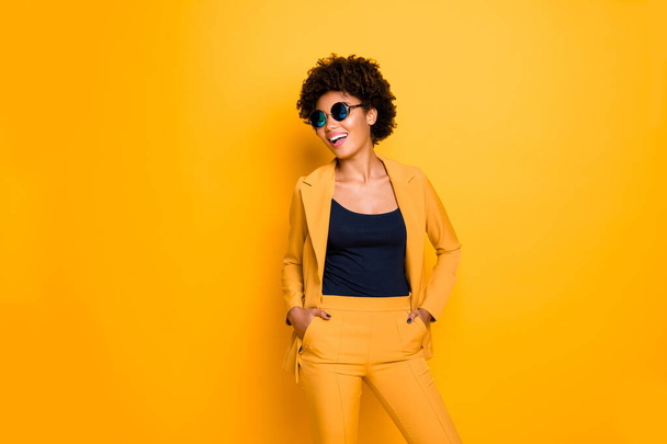 Portrait of her she nice-looking well-dressed luxurious fashionable attractive lovely cheerful cheery glad wavy-haired girl isolated over bright vivid shine vibrant yellow color background - Foto, Imagem