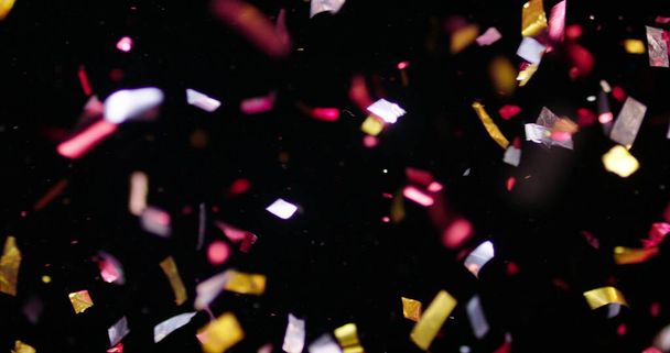 Confetti Isolated on Black Background - Foto, afbeelding