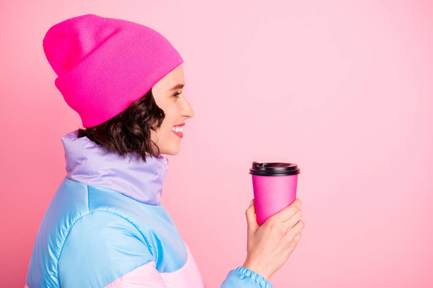 Photo of beautiful lady holding hands hot beverage for best friend wear warm colored coat isolated pink background - Photo, Image