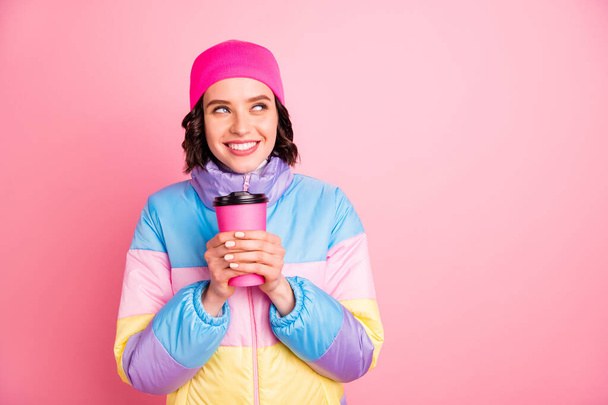 Closeup photo of beautiful lady holding hands hot take out beverage wear warm colored coat isolated pink background - Fotoğraf, Görsel
