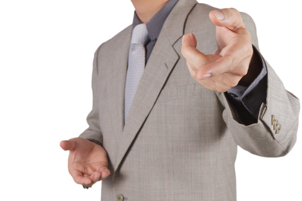 Homme d'affaires appuyant sur un bouton imaginaire sur l'écran virtuel
 - Photo, image