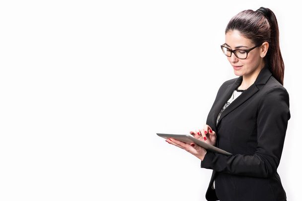 Beautiful female corporate worker with tablet  - Zdjęcie, obraz