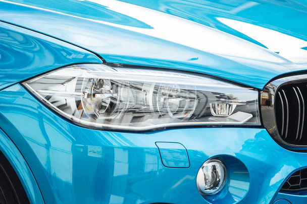 Modern car headlights in close up view - 写真・画像