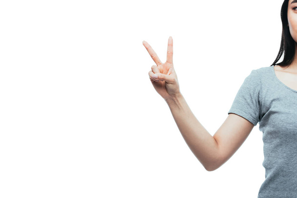 cropped view of asian girl showing peace sign isolated on white - Foto, immagini
