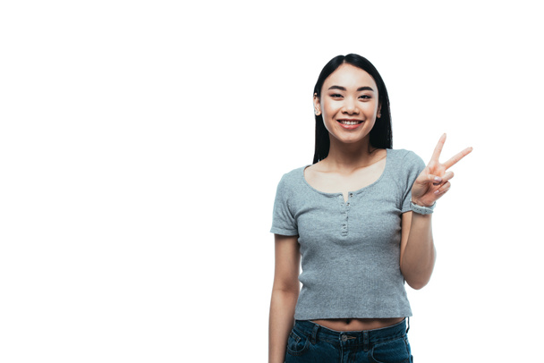 happy asian girl showing peace sign isolated on white - Photo, Image