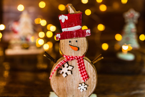 Christmas decorations against blurred background. Small wooden s - Photo, Image