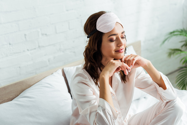 attractive woman in sleeping mask with closed eyes at morning  - Photo, Image