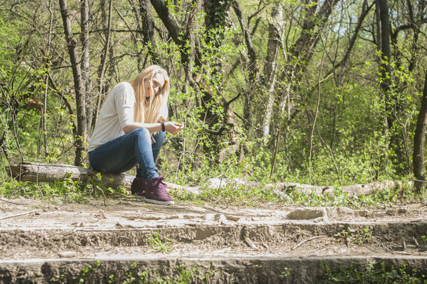 beautiful blond woman in nature - 写真・画像
