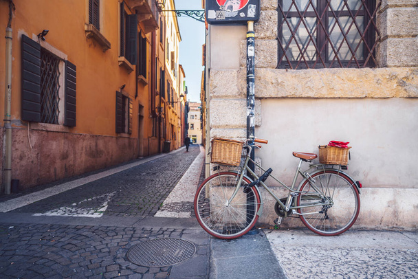 Bicycle with a basket on the street - 写真・画像