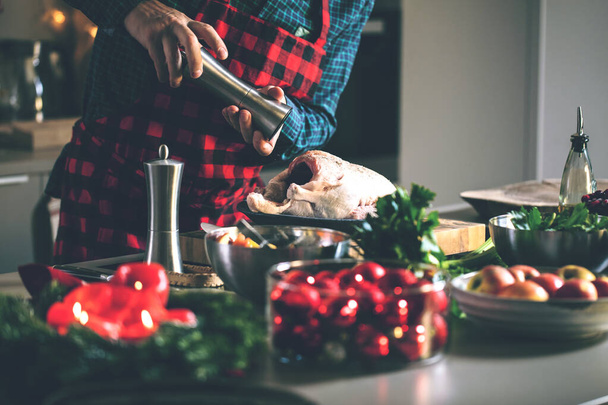 close-up partial view of man preparing delicious and healthy food in the home kitchen for christmas  - Valokuva, kuva