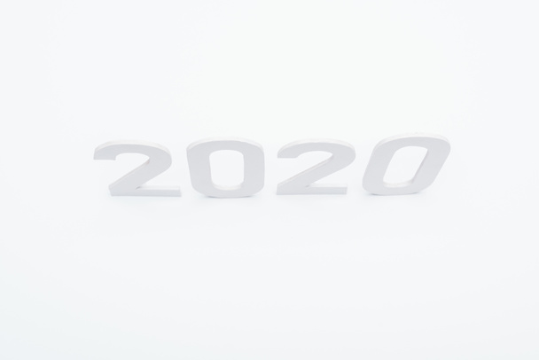 top view of paper 2020 numbers on white background - Zdjęcie, obraz