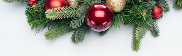 top view of Christmas tree wreath with baubles on white background, panoramic shot - Photo, Image