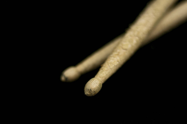 Wooden drumsticks worn by the intense rhythm - Photo, Image