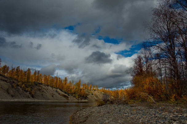Russia. Far East. The colours of autumn are cold-water rivers of Magadan, tributaries of the Kolyma river - Photo, Image