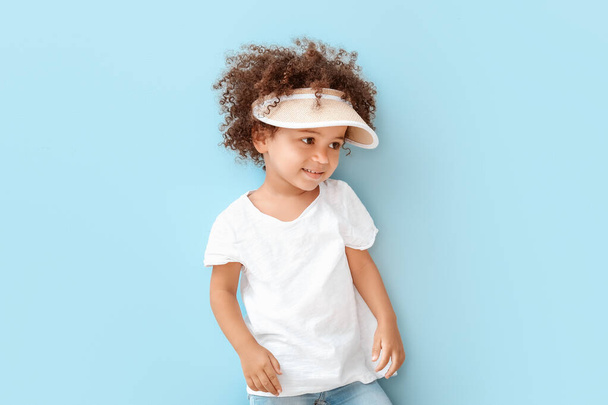 Portrait of little African-American girl on color background - Zdjęcie, obraz
