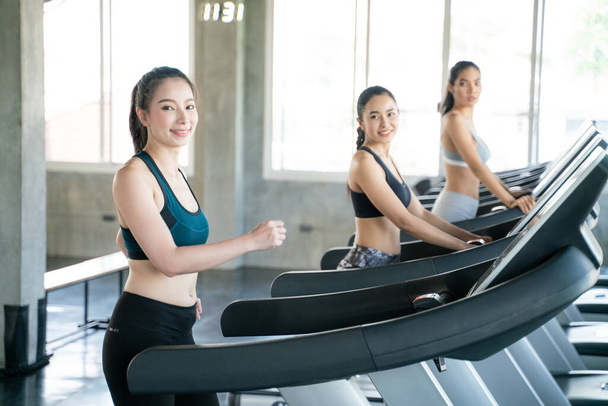 Group of sport asian women running on treadmill - Fotoğraf, Görsel