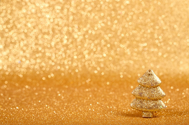 Golden christmas fir tree  - Фото, зображення