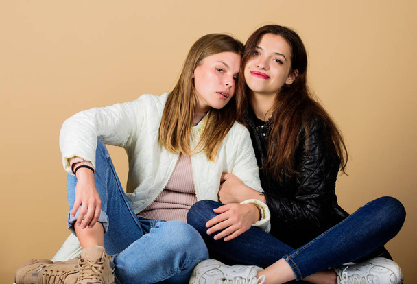 always together. happy women in spring jacket. warm clothing fashion. girls relax and embrace. seasonal shopping. beauty and fashion. female friendship in action. family values. they love each other - Foto, Imagem
