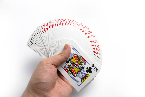 Ventilátor karty v ruce na bílém pozadí izolátu - Fotografie, Obrázek