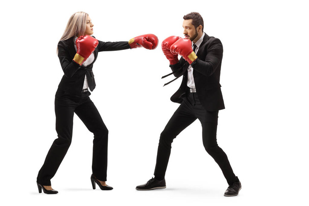 Businessman and businesswoman in sparring with boxing gloves - Foto, Imagem