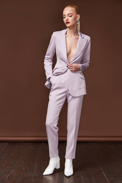 Beautiful sexy woman wear for meeting date business style suit j - Фото, зображення