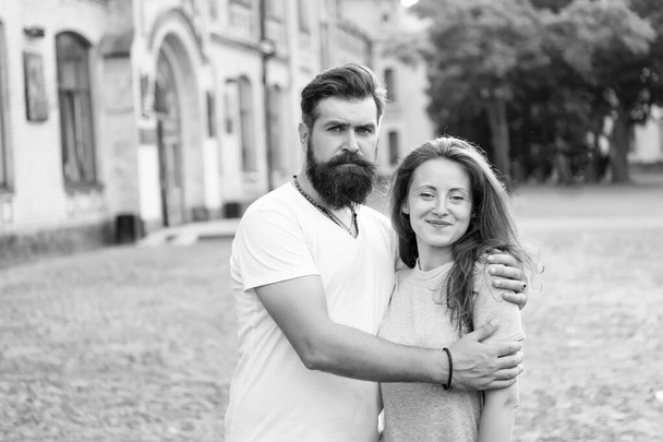 Enjoying togetherness. Couple in love. Couple of bearded man and sexy woman. Family couple hugging on summer outdoor. Sensual couple spending time together - Foto, Imagem