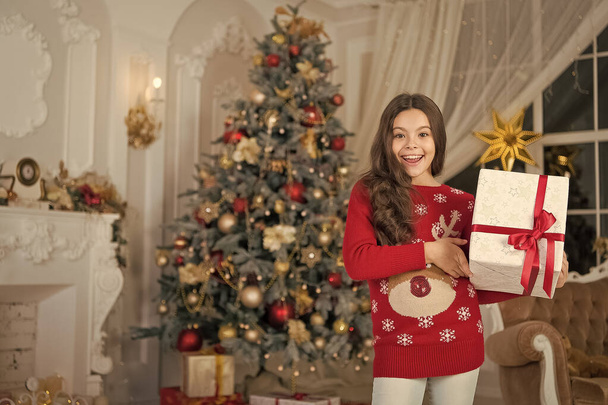 small happy girl at christmas. Christmas. Kid enjoy the holiday. The morning before Xmas. New year holiday. little child girl likes xmas present. Happy new year. Christmas Sales. Are you ready - Foto, imagen