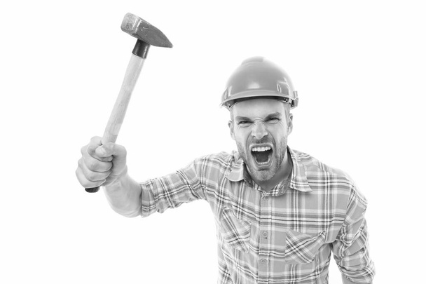 Angry boss. Destroy and build. Repair service. Repair and renovation concept. Handyman home repair. Repairing and renovating. Home improvement. Man in helmet aggressive laborer. Repair workshop - Foto, Bild
