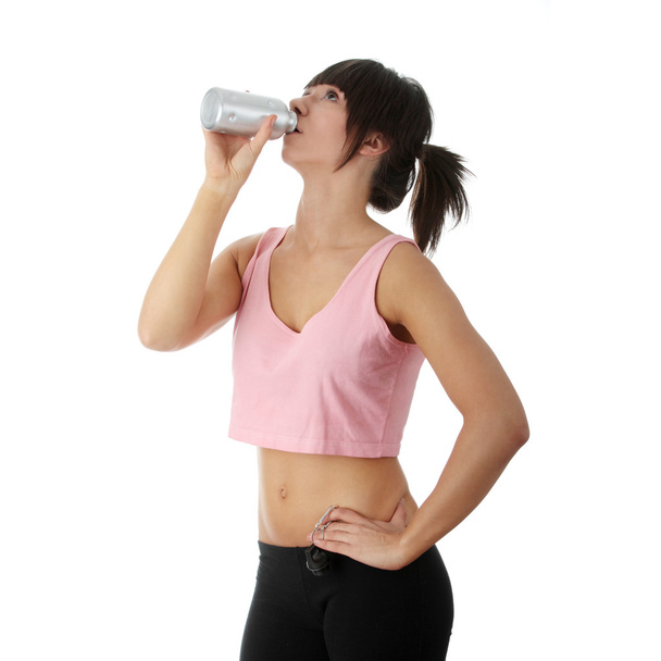 Woman drinking from water-bottle - Foto, Imagem