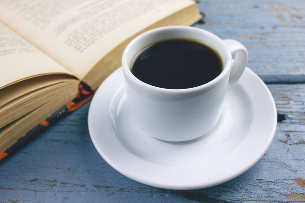 book with black coffee on the table - Photo, image