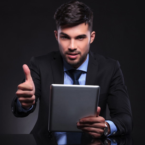 young business man with tablet shows ok - Photo, image