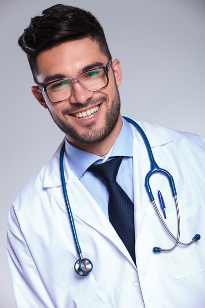 young doctor smiles for the camera - Photo, Image