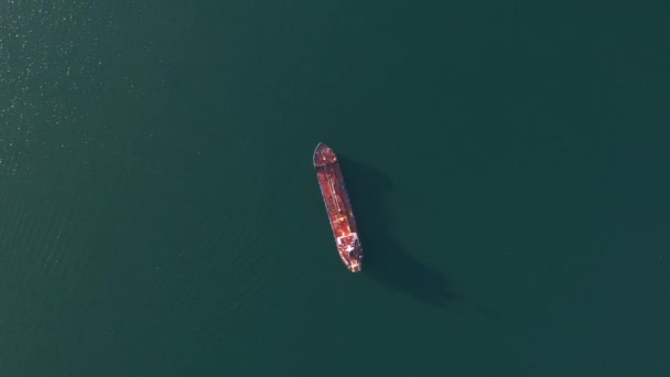 Top aerial view of the large crude oil tanker ship sailing in sea to loading port - Footage, Video