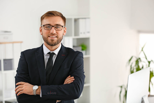 Portrait of handsome businessman in office - Photo, Image