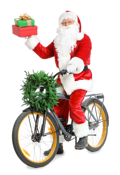 Санта-Клаус с рождественскими подарками и велосипедом на белом фоне
 - Фото, изображение