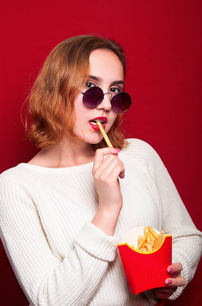 beautiful girl with French fries and drink - Photo, Image