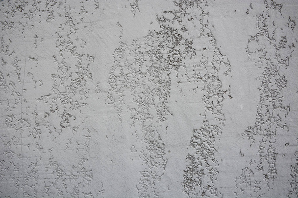 Παλιά γκρίζα τραχιά τσιμεντένια υφή τοίχου. Σχέδιο πέτρινης επιφάνειας. - Φωτογραφία, εικόνα