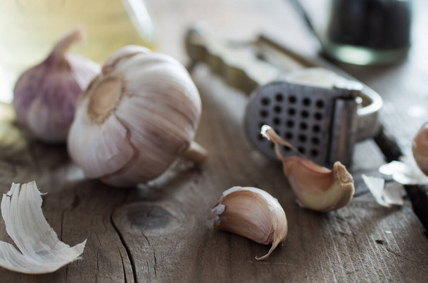 Still life of garlic and oil - Photo, Image