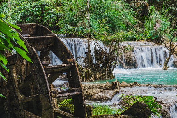 Kuang Si water falls with an old water wheel,Laos - Photo, Image
