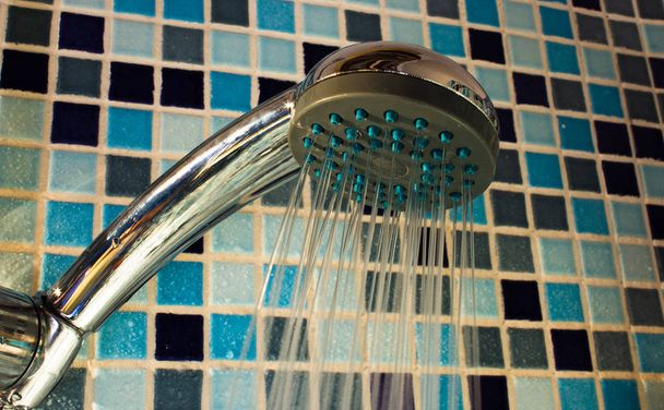 taking a shower is environmentally friendly if the water is clos - Photo, Image