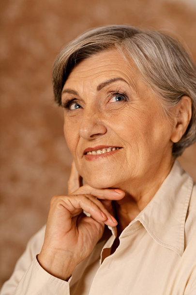 portrait of happy senior woman  - Фото, изображение